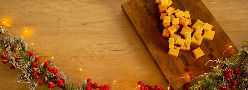 Christmas,Tree,Made,Of,Cheese,On,A,Wooden,Plank,And